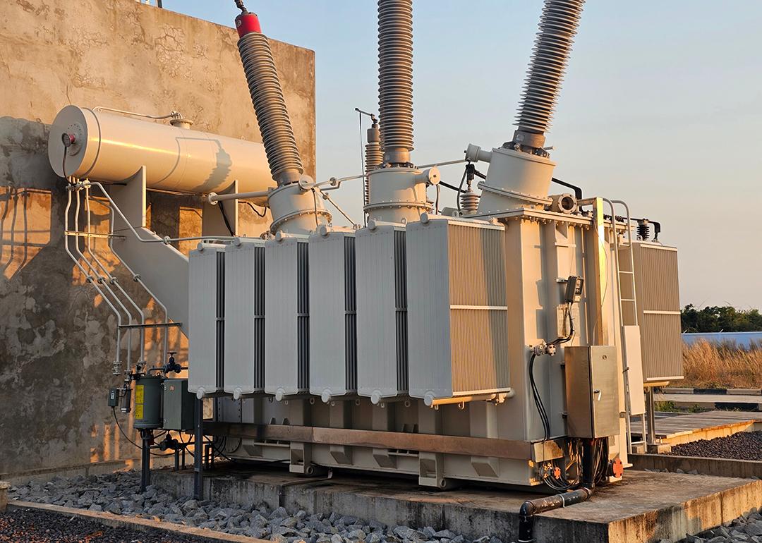 A three-phase 115kV power transformer.
