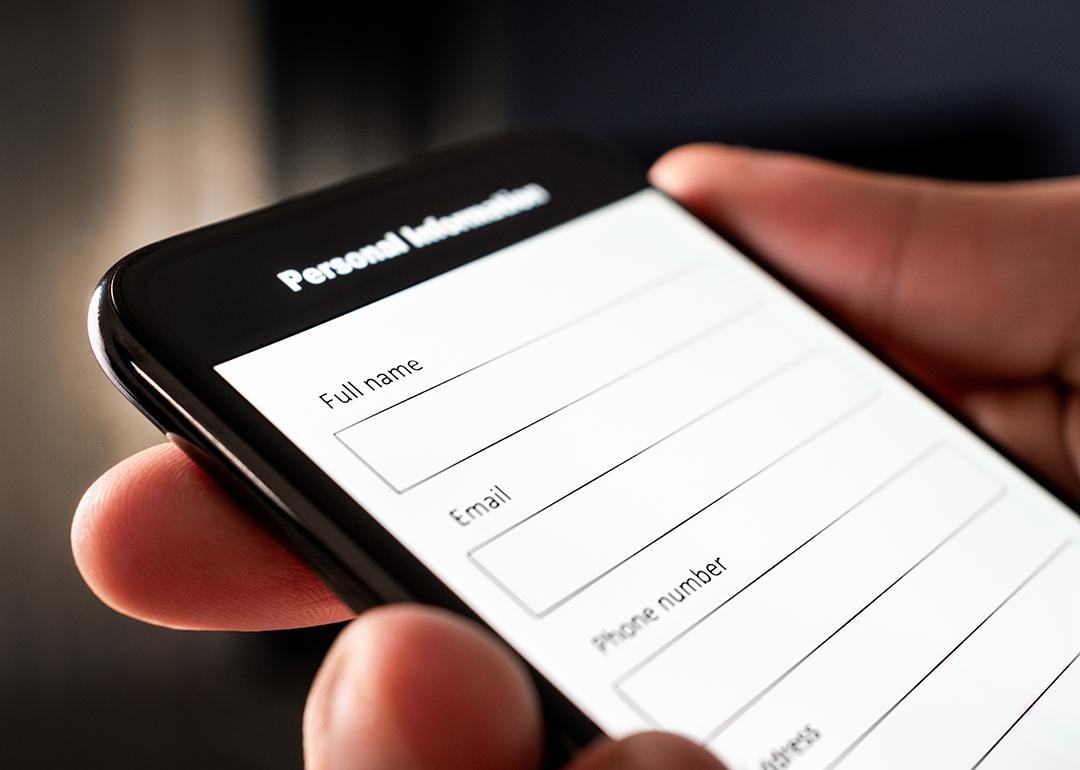A user filling out the personal information part of an online survey using a smartphone.