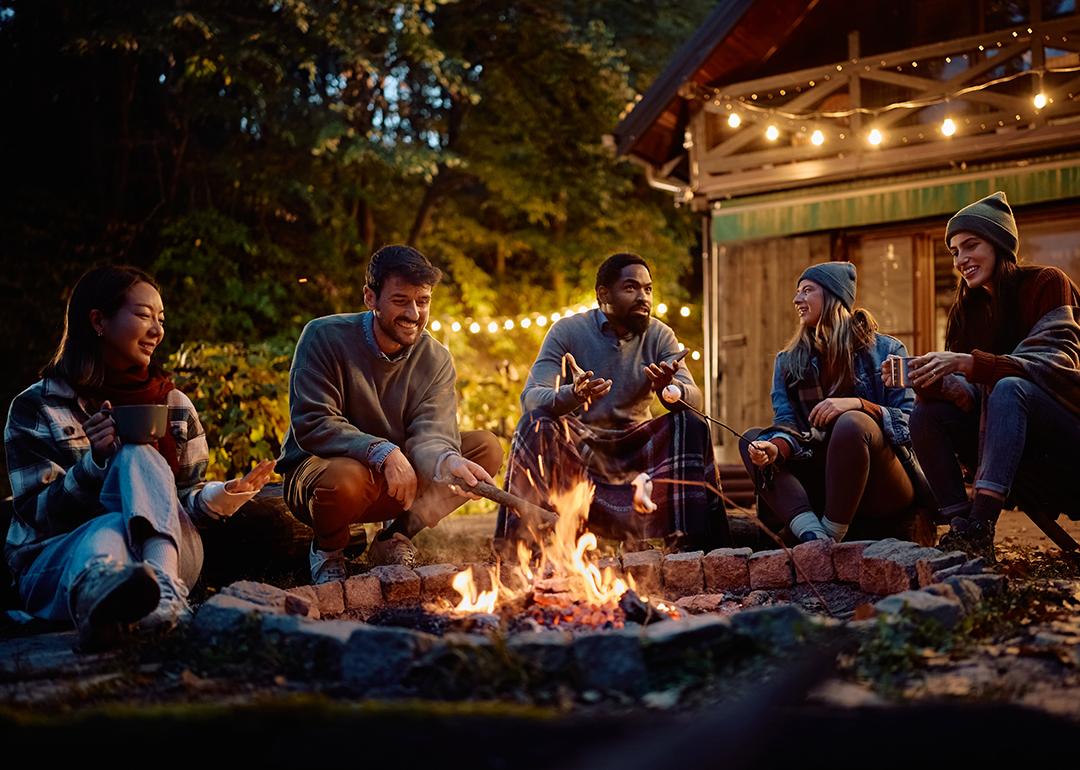 A group of friends around a campfire.