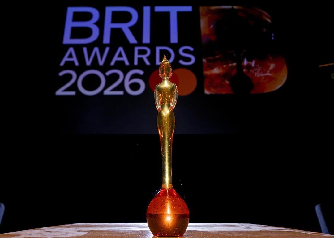 A close up on a BRIT award trophy against a background for the 'BRIT Awards 2026'.