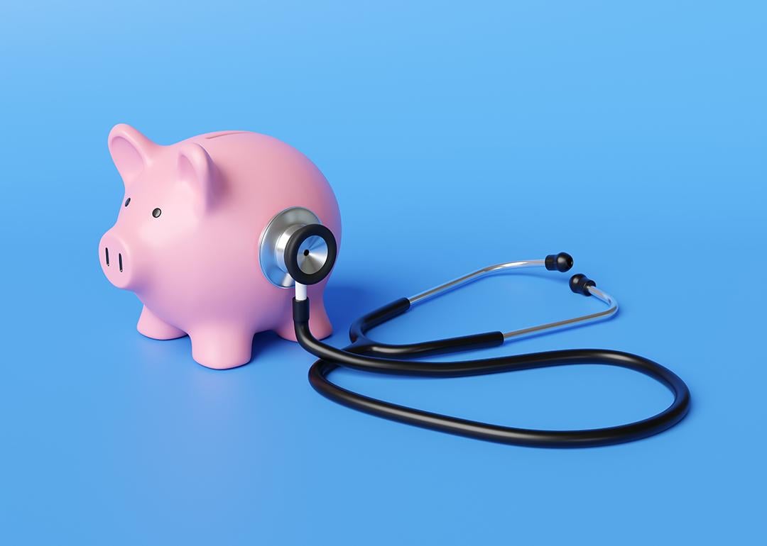 A piggy bank with a stethoscope.