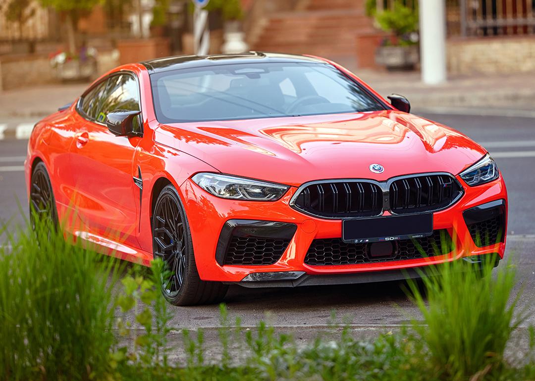 A red BMW M8 car.