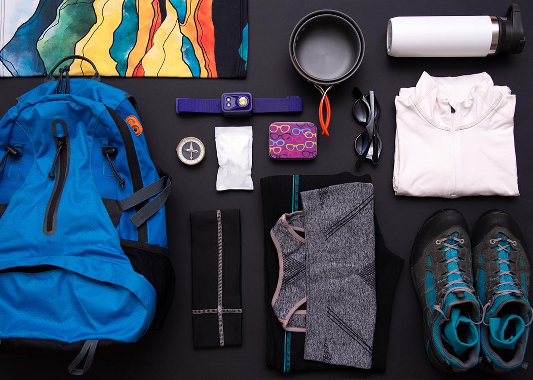 A flat lay set of hiking gear and essentials.