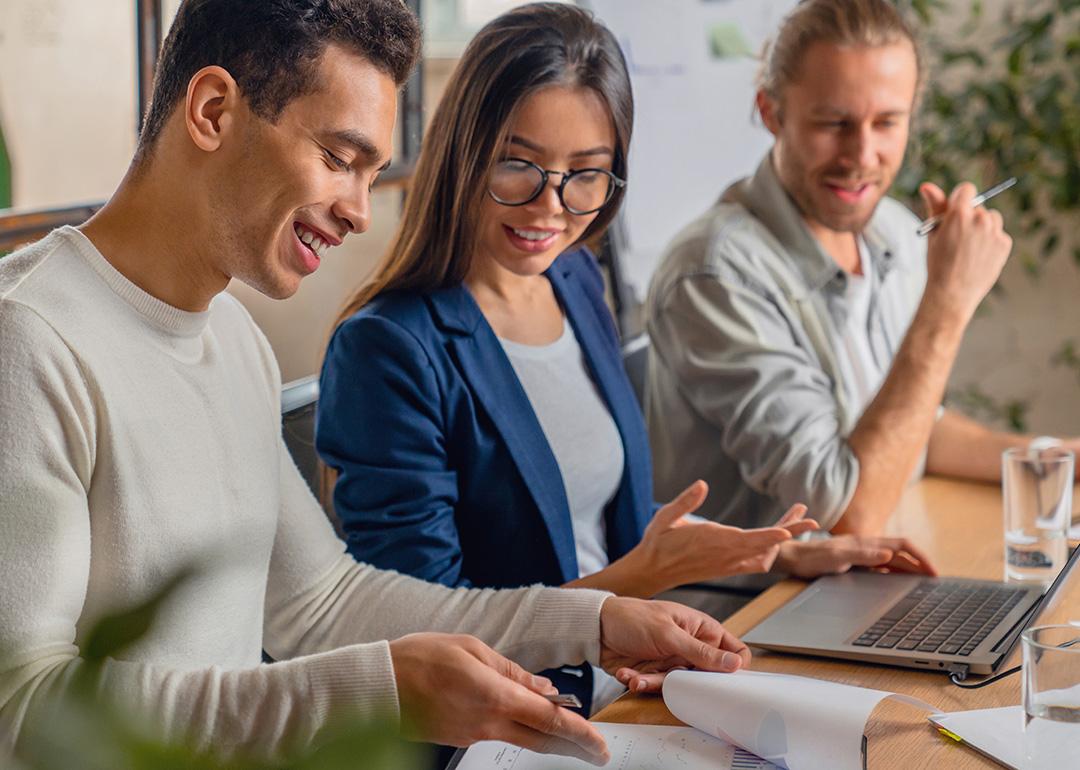 A startup business team working on a project together.