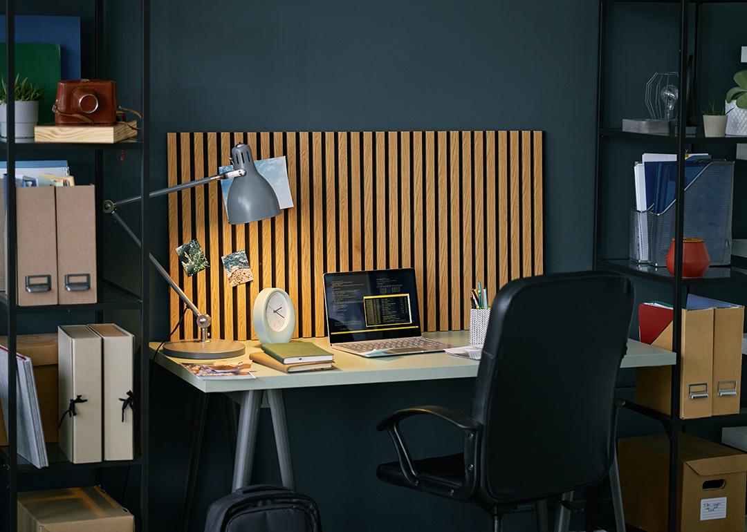 A modern home office setup featuring a wooden desk.