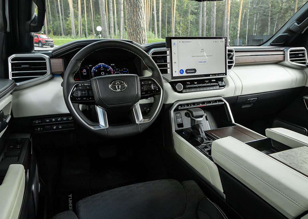 The interior of new modern SUV car with automatic transmission.