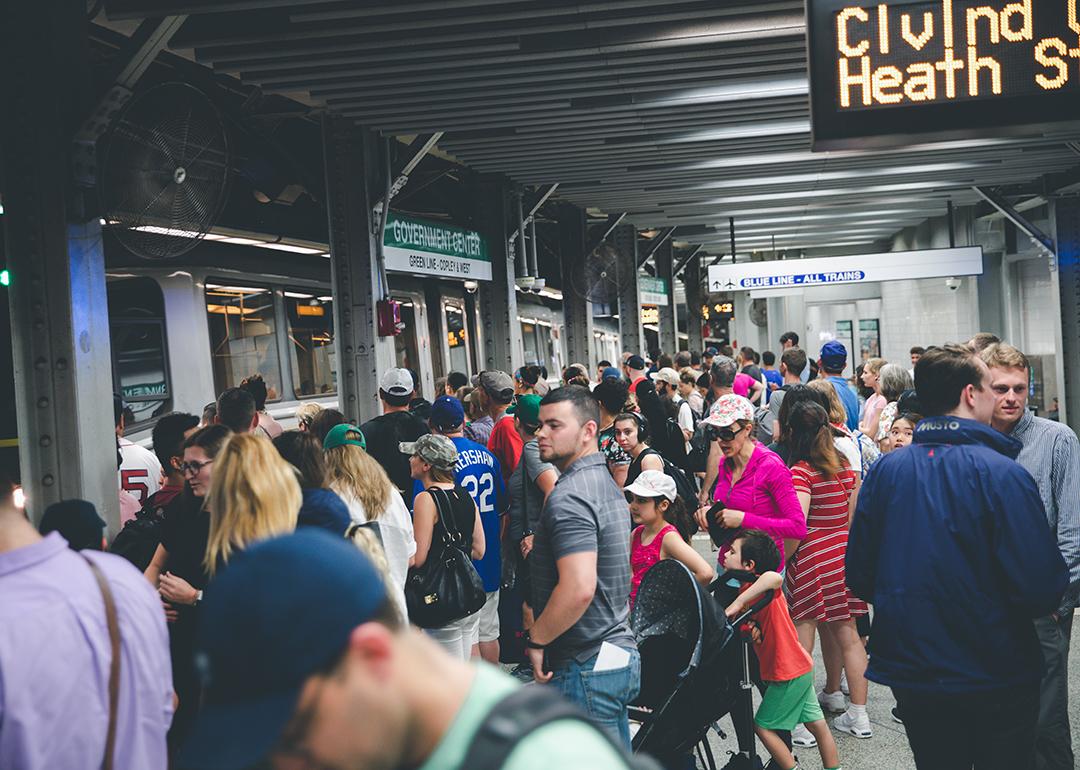 Passengers waiting at the green line stop platform in Government Center Station, Boston. 