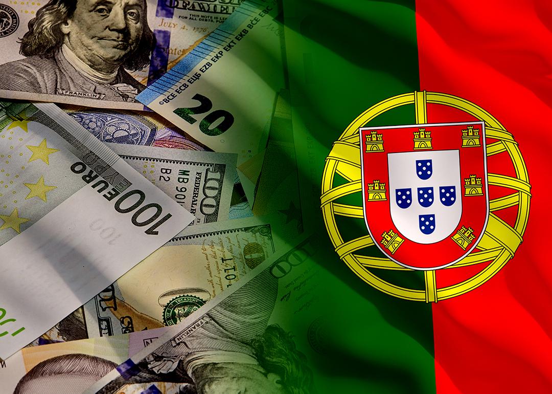 Flag of Portugal fading into a background of US and Euro banknotes.