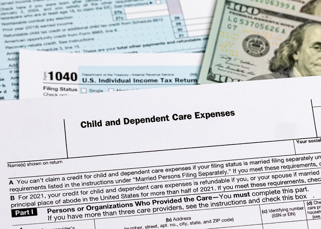 A 'child and dependent care expenses form on top of other US tax documents.