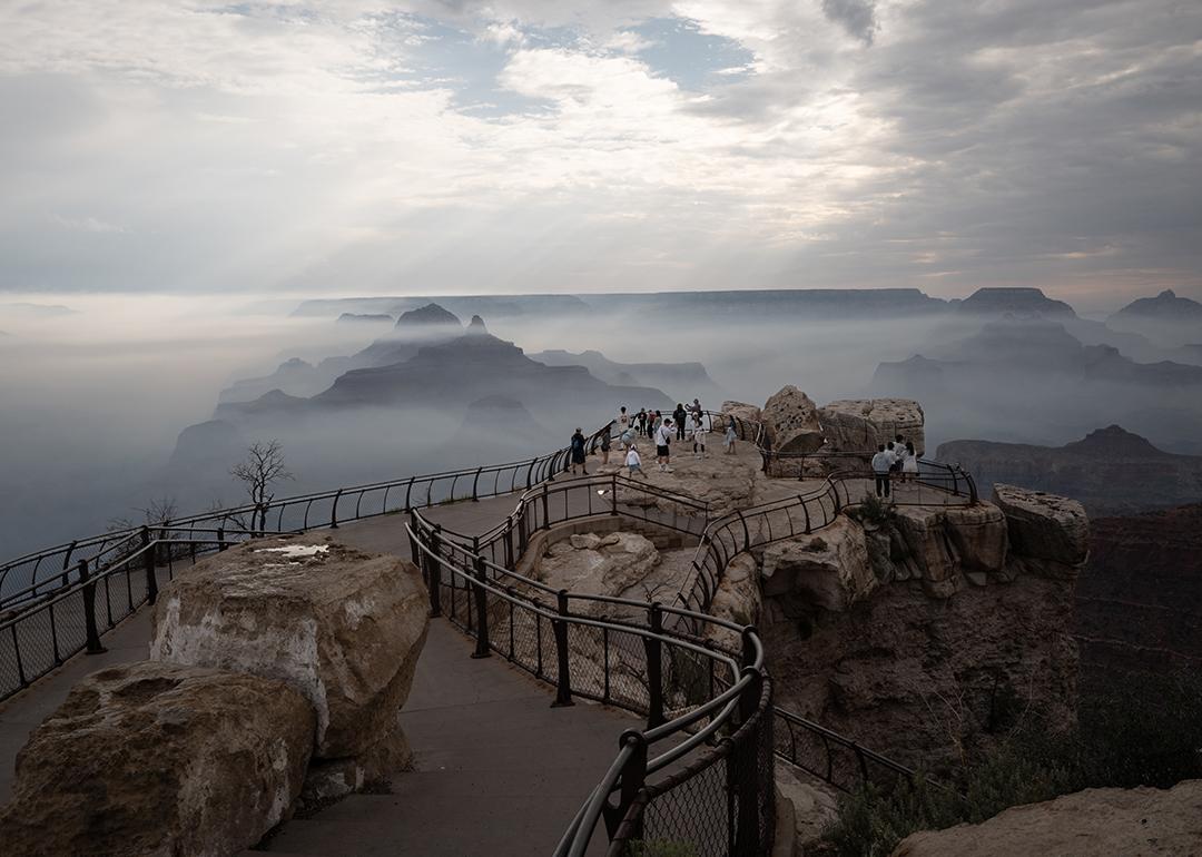 Smoke from the Dragon Bravo fire settles into the Grand Canyon along the South Rim at Mather point on July 17, 2025 in Grand Canyon, Arizona. 