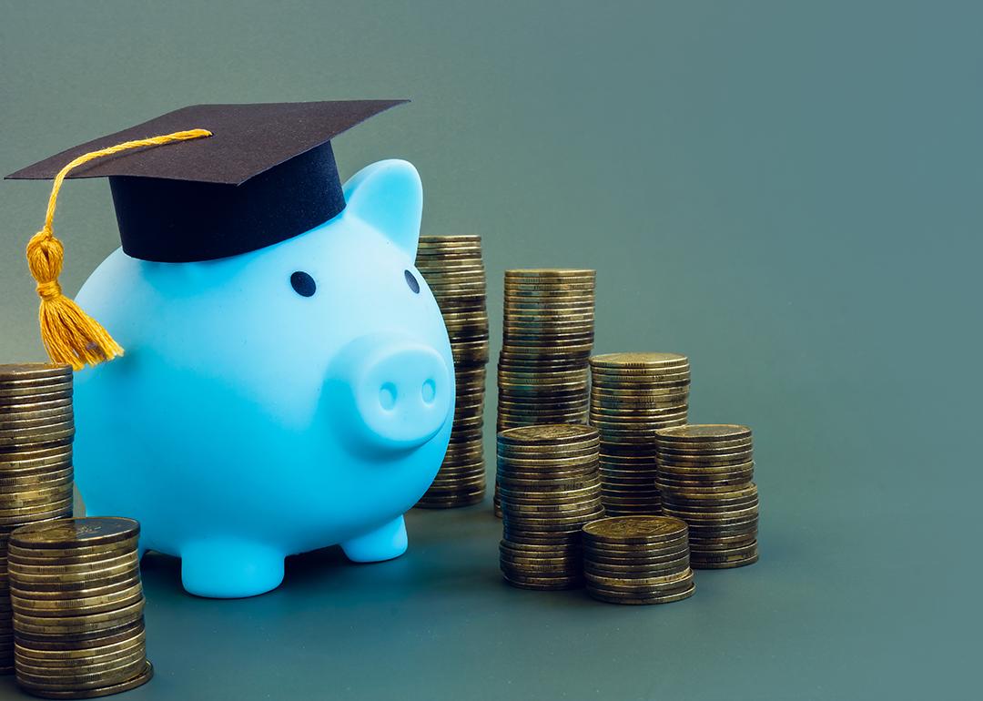 A piggy bank with a graduation cap as a concept of saving for studies.