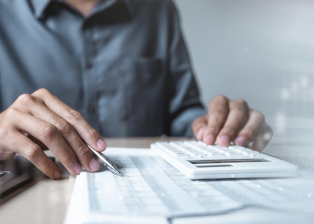 An accountant analyzing financial documents. 