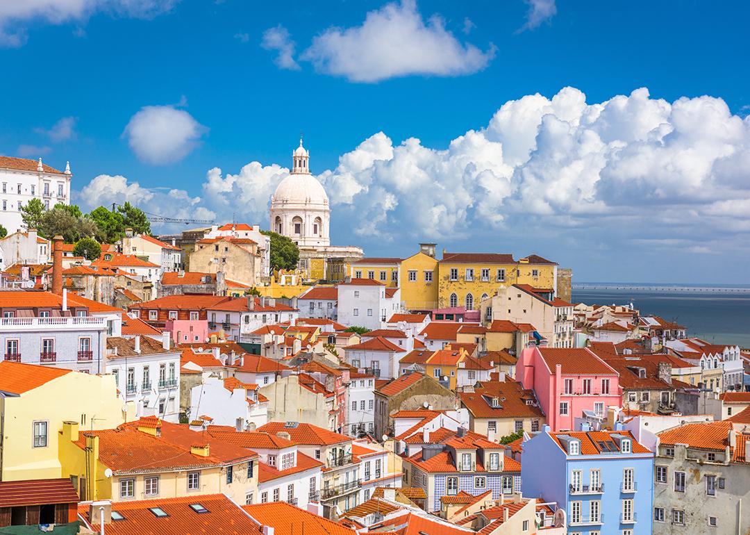 Lisbon, Portugal's city skyline over the Alfama district.