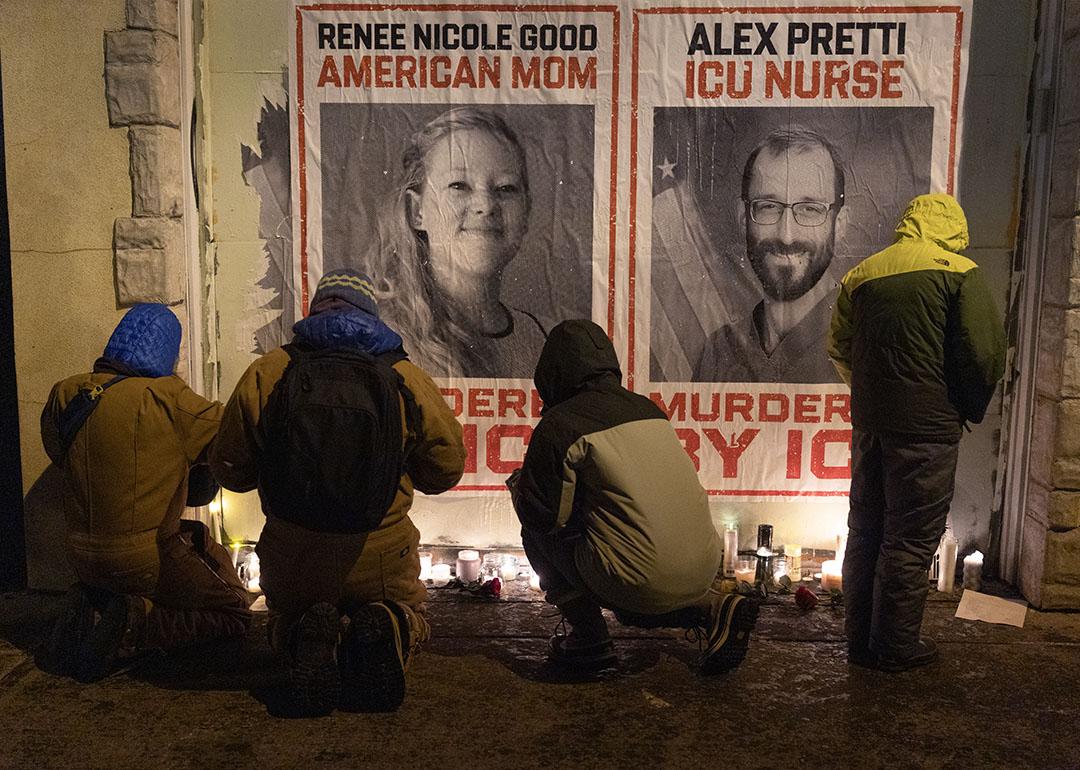People attend a candlelight vigil organized by healthcare workers at the site where Alex Pretti was killed on January 24, 2026 in Minneapolis, Minnesota.