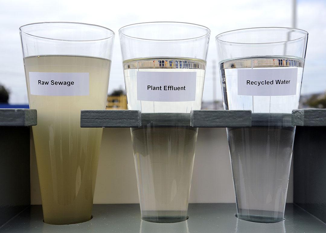Three glasses of water showing results of reverse osmosis tubing.