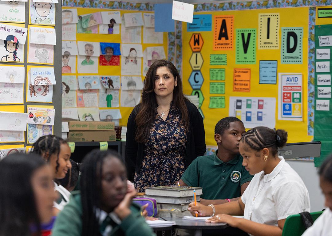 A 7th and 8th grade social studies teacher overseeing her class.
