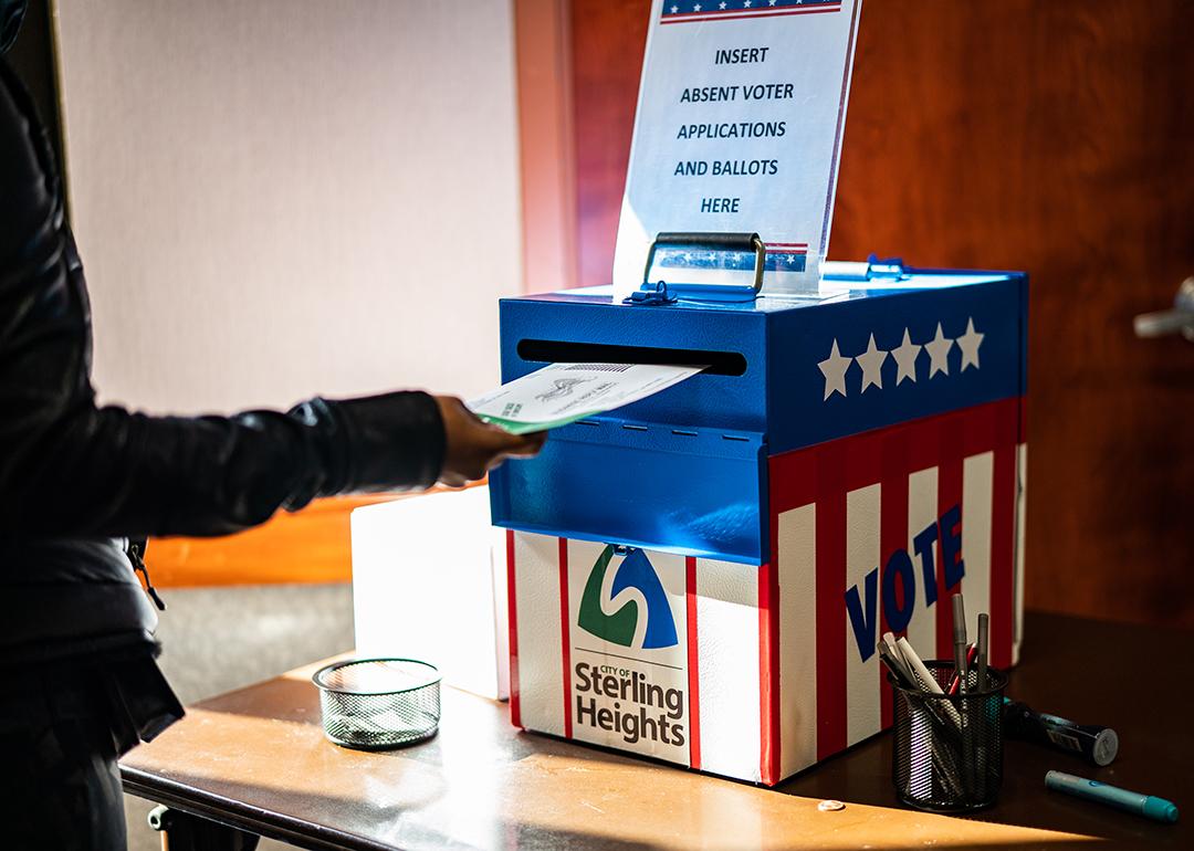 A voter casting an absentee ballot at the Sterling Heights Election Center in Michigan, USA.