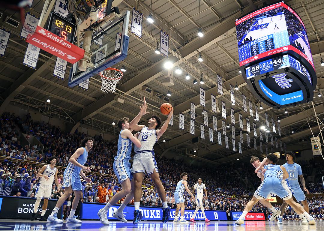 Cameron Boozer #12 of the Duke Blue Devils posts up against Henri Veesaar #13 of the North Carolina Tar Heels during the second half of the game at Cameron Indoor Stadium on March 07, 2026 in Durham, North Carolina. 