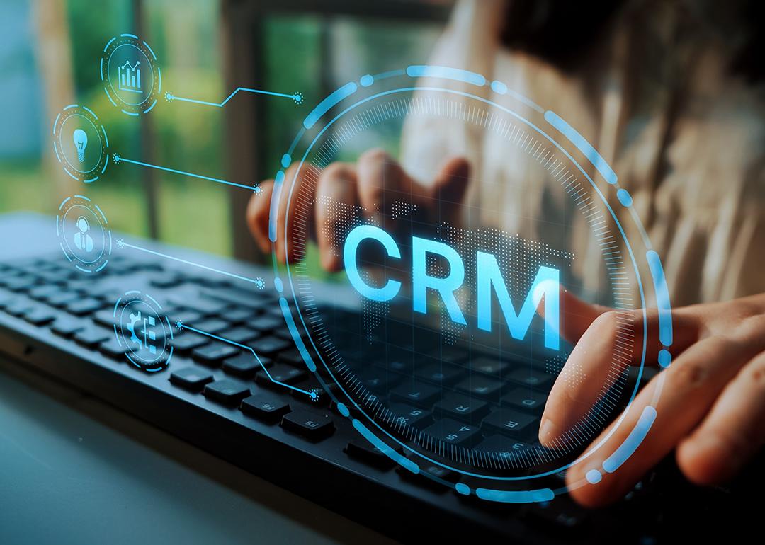 An analyst evaluating data through CRM or Customer Relationship Management.