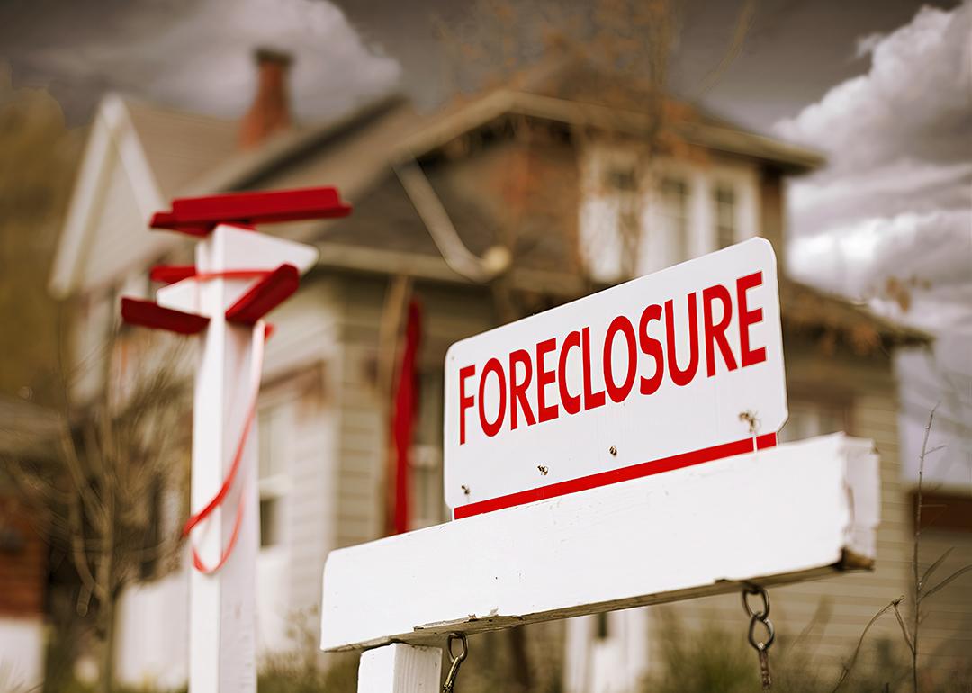 A foreclosure sign seen in front of a house.