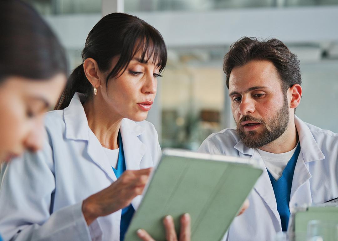 A team of doctors in office for a medical case review.