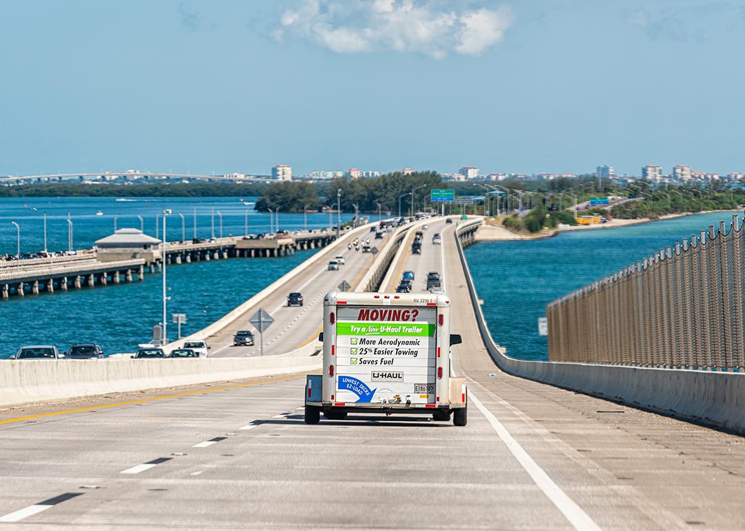 A U-Haul trailer truck crossing the Tampa Bay bridge in Florida.