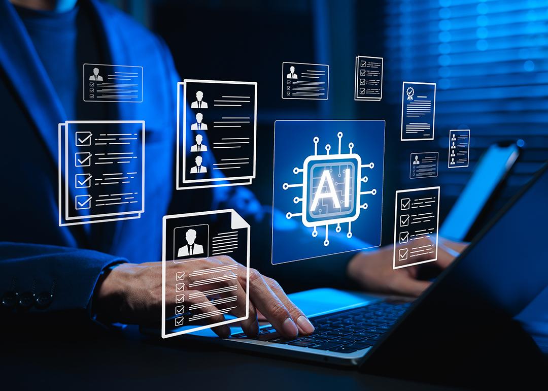 Businessman using a laptop illustrated with AI-powered software graphics.