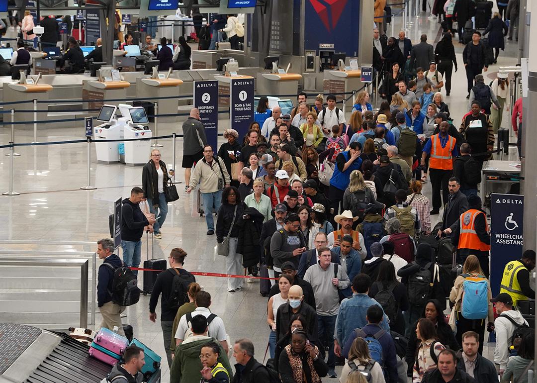 ravelers wait in long lines at Hartsfield-Jackson Atlanta International Airport on March 16, 2026 in Atlanta, Georgia. 