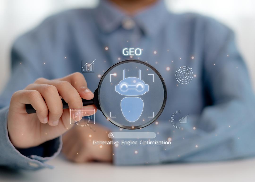Person holding a magnifying glass illustrated with GEO concept graphics.