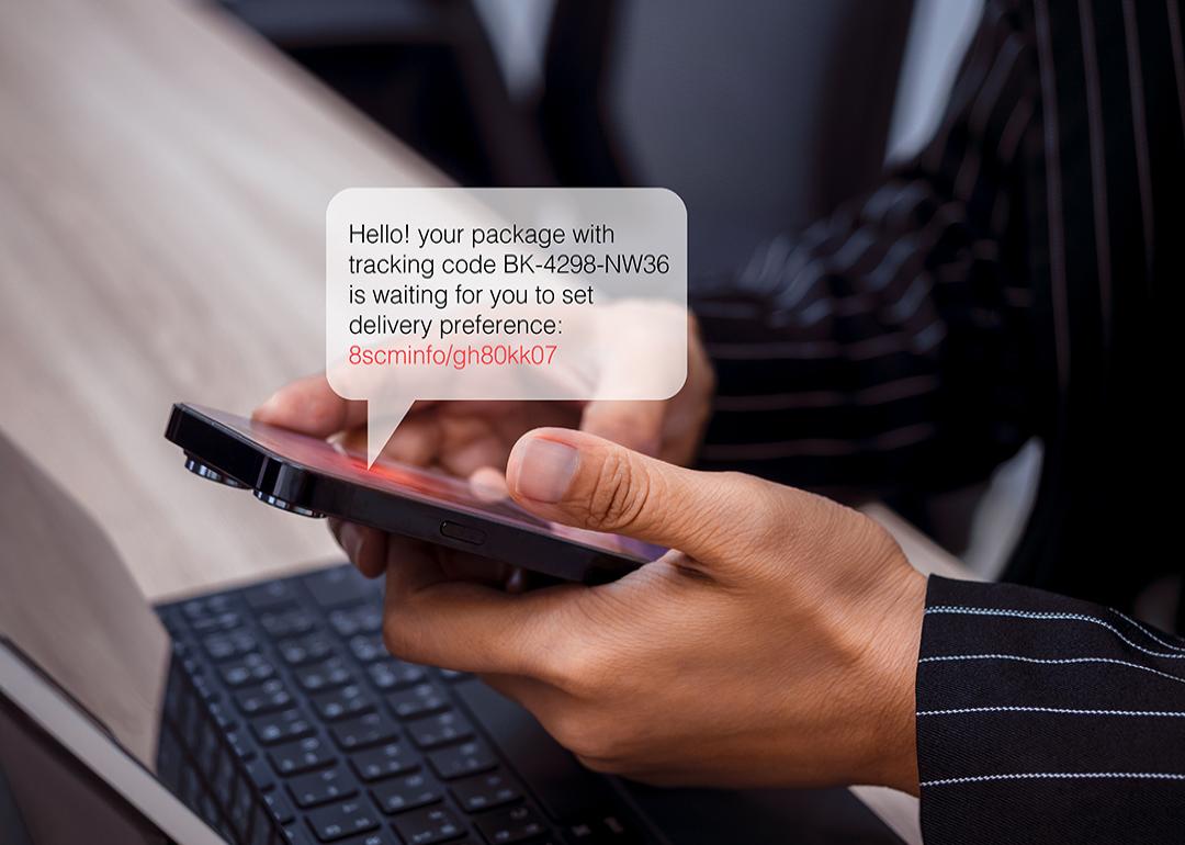 Person using phone with an illustration of an SMS bubble showing potential scam with phishing link.