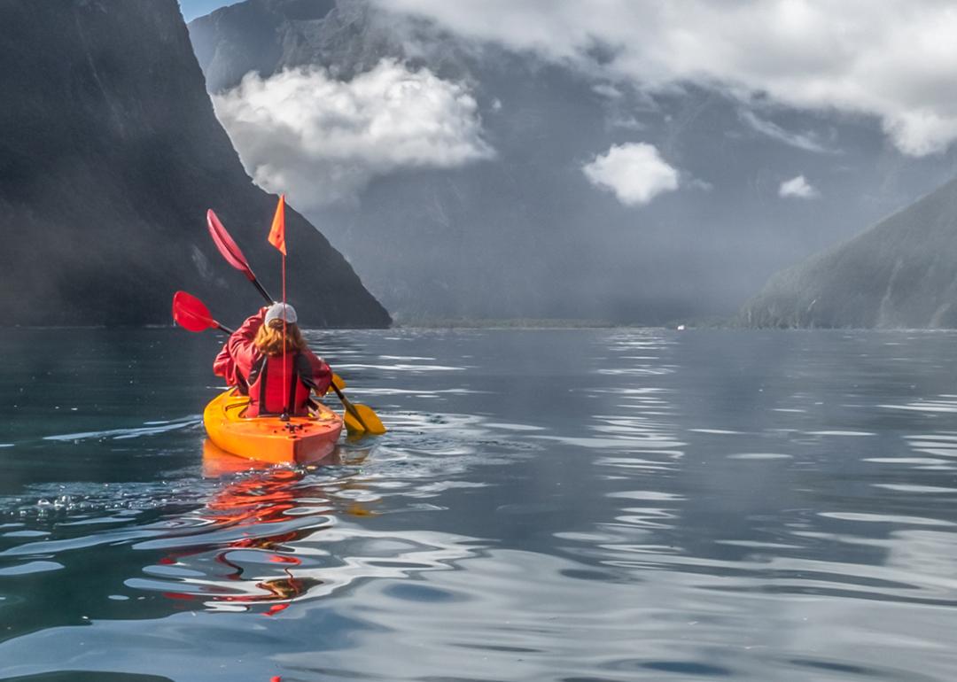 Kayakers on a lake.