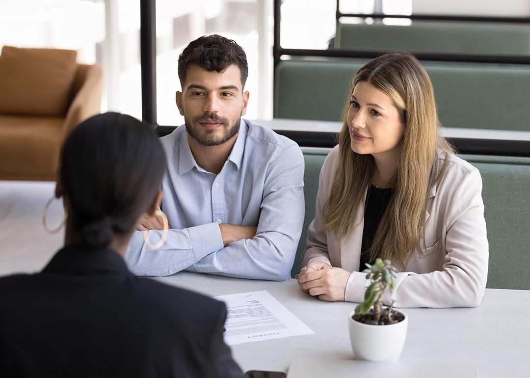 A couple seeking advice from a financial advisor.