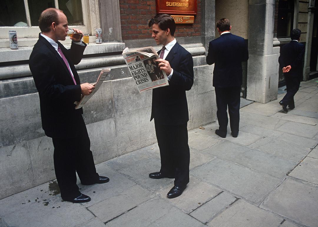 Businessmen in 1992 reading a Daily Express newspaper when Prime Minister John Major announced the Pound Crisis.
