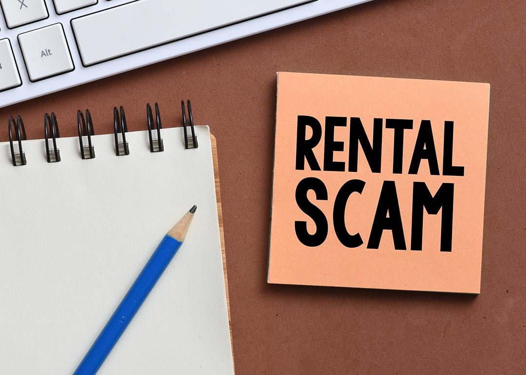A rental scam text on a note.