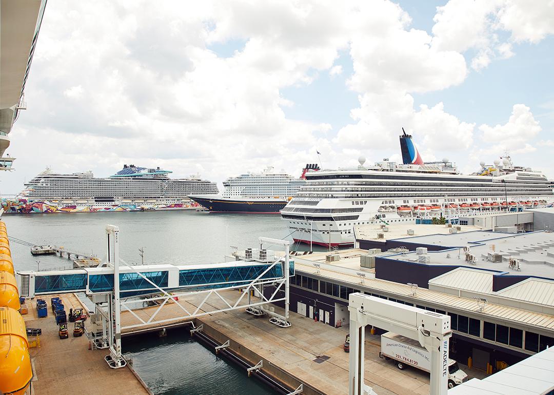 Cruise ships from NCL, Disney, Carnival, and Royal Caribbean docked at Port Canaveral in Florida.