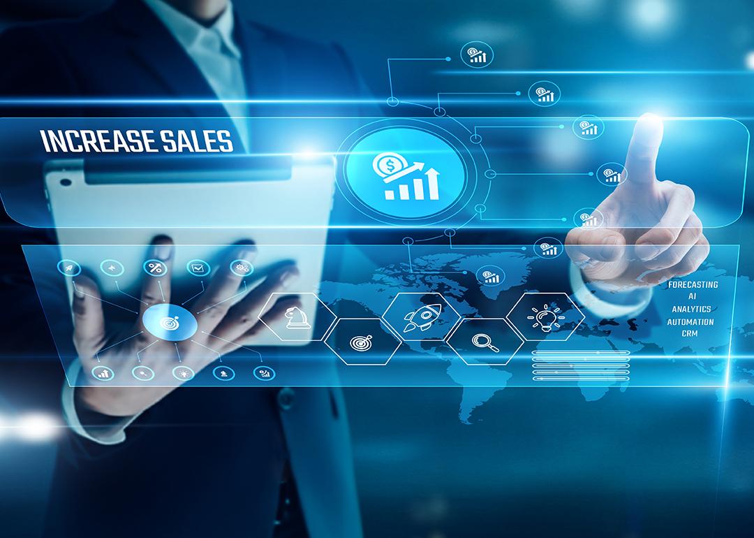 Businessman analyzing global networks sales growth.