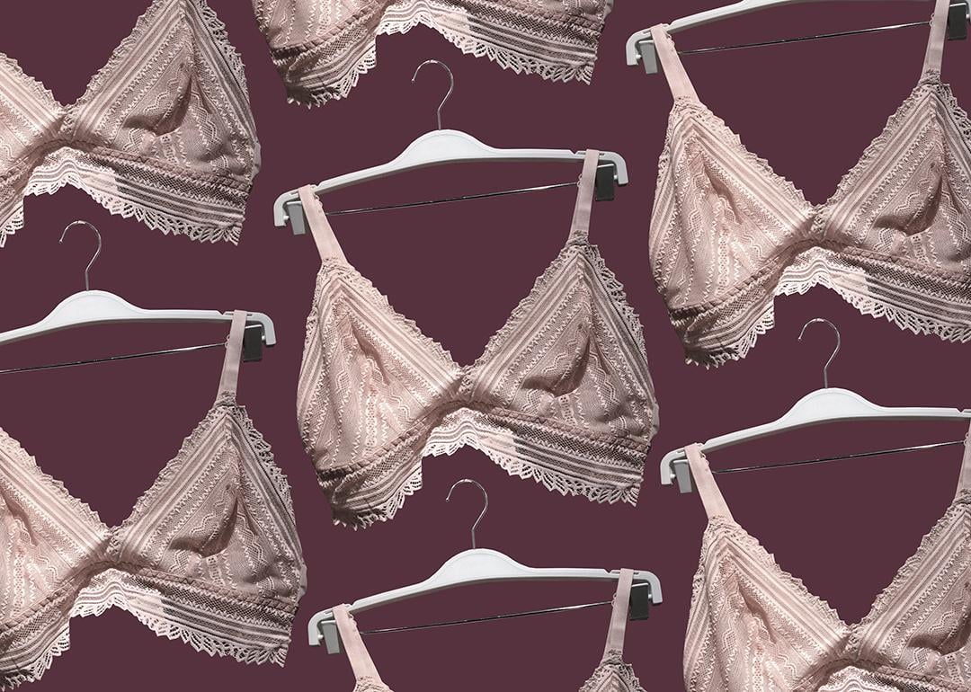 Pink lace unlined bras on a hanger.