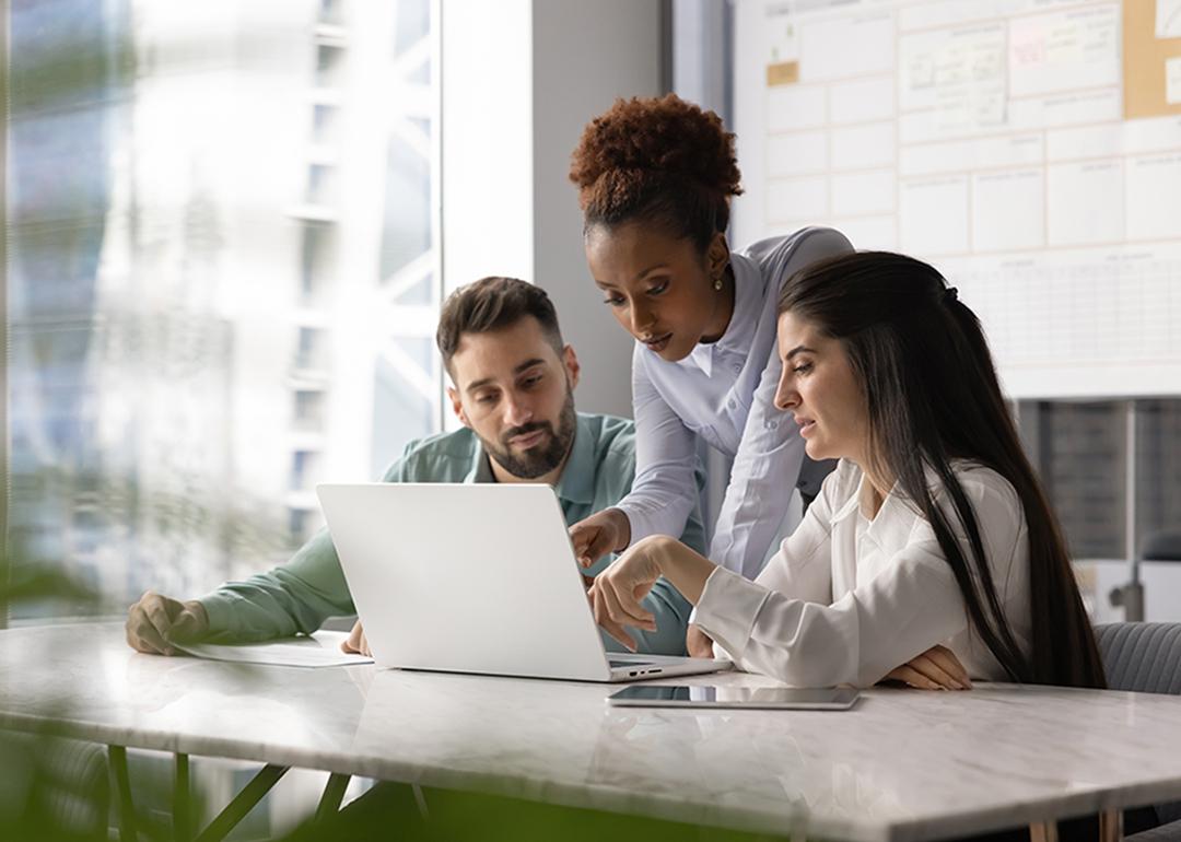 A group of work colleagues discussing about business strategies.