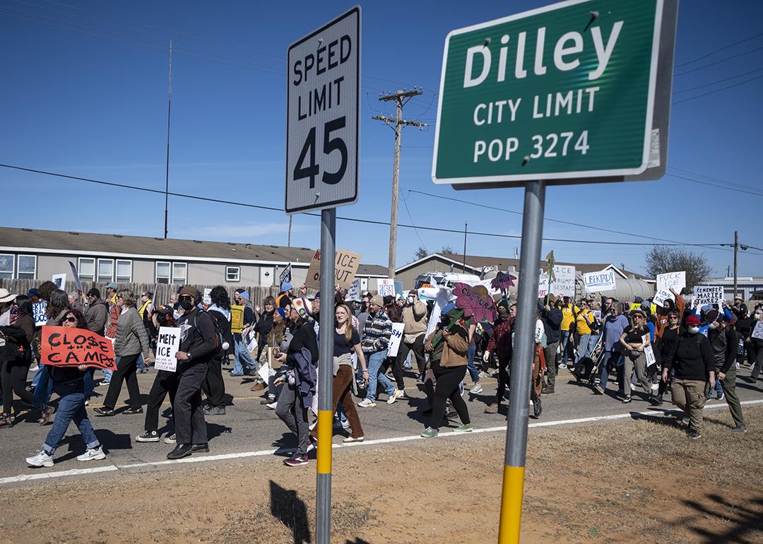Denouncing detention of 5-year-old Liam Ramos, protesters march toward the South Texas Family Residential Center on January 28, 2026 in Dilley, Texas.