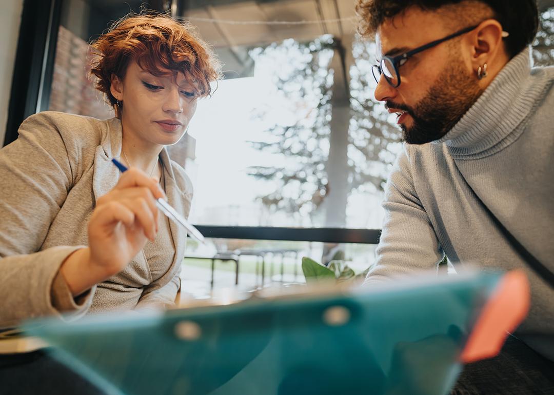 A diverse business team engaged in a discussion.
