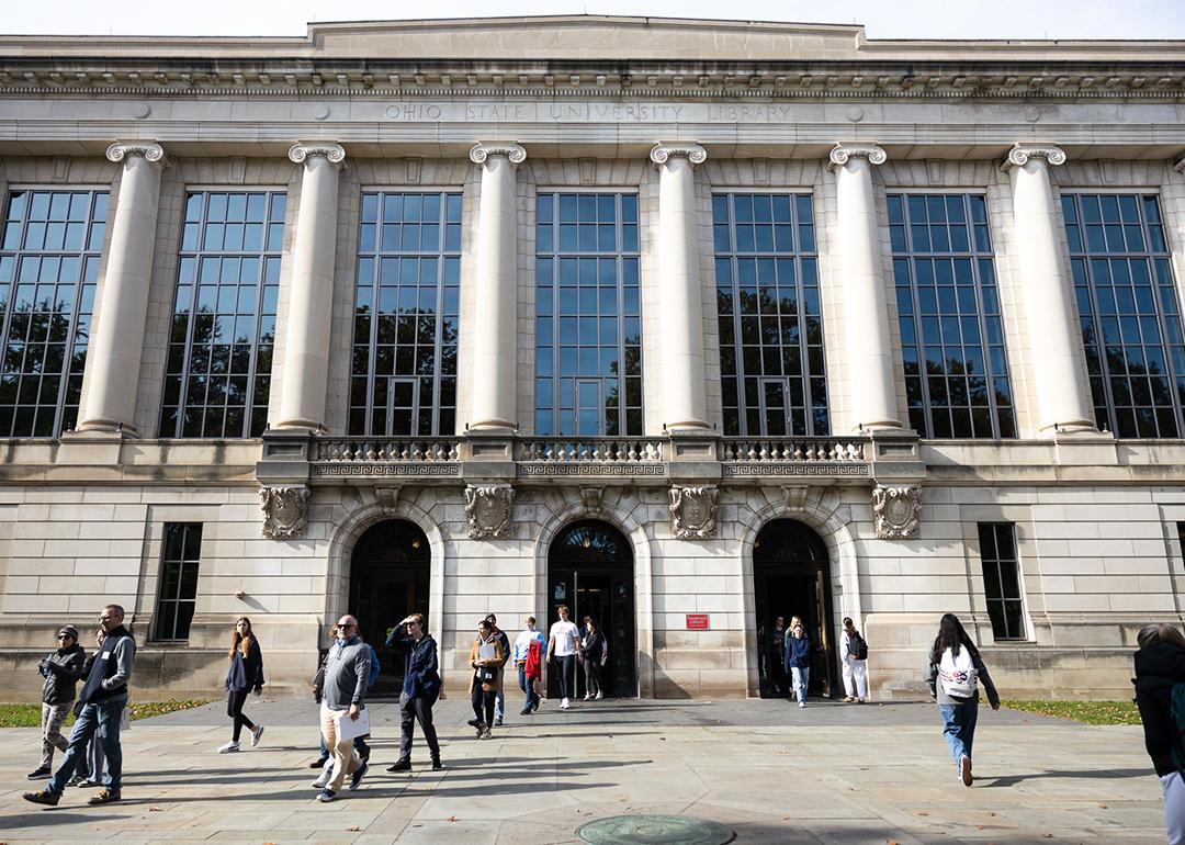 Students walk across the campus of The Ohio State University in Columbus, Ohio on November 6, 2023.