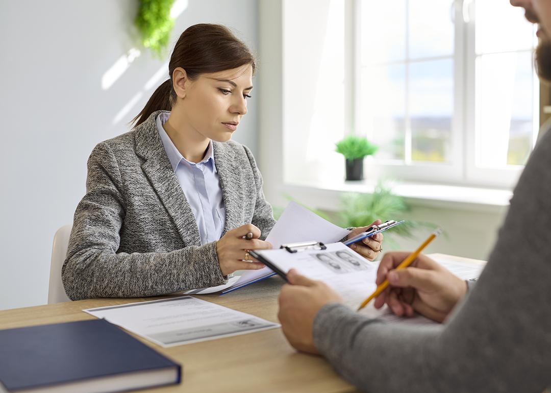 Recruiters review candidates' resumes.