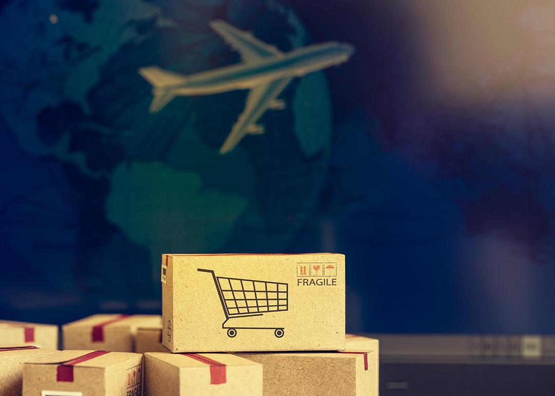 Fragile boxes with a background of air cargo as a concept of international shipping.
