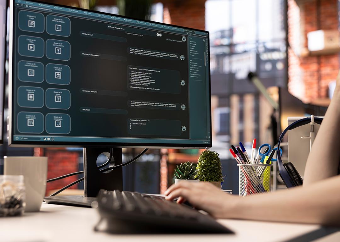 An employee using an online AI assistant application for automated tasks.