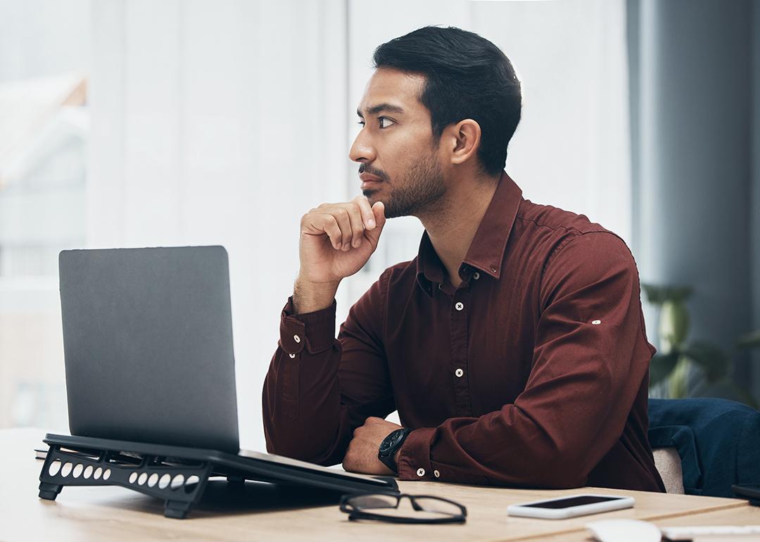 A business employee planning on solutions for a work project in an office.l