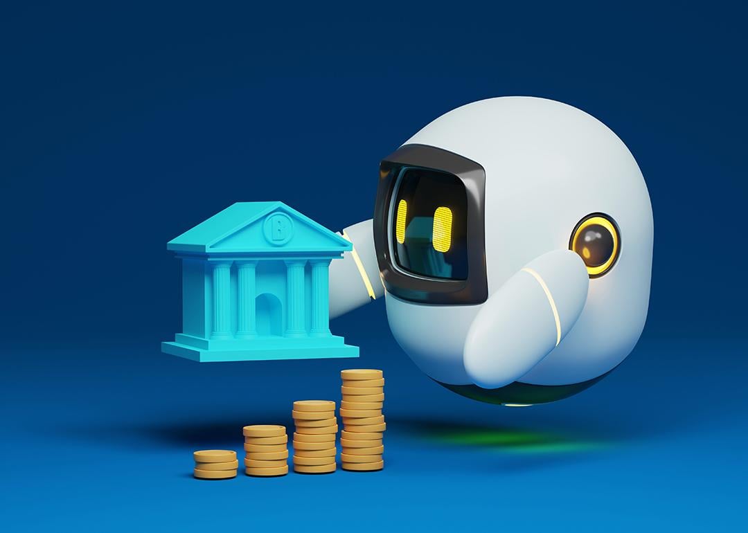 A 3D illustration of a robot holding a bank with coins in a blue background.