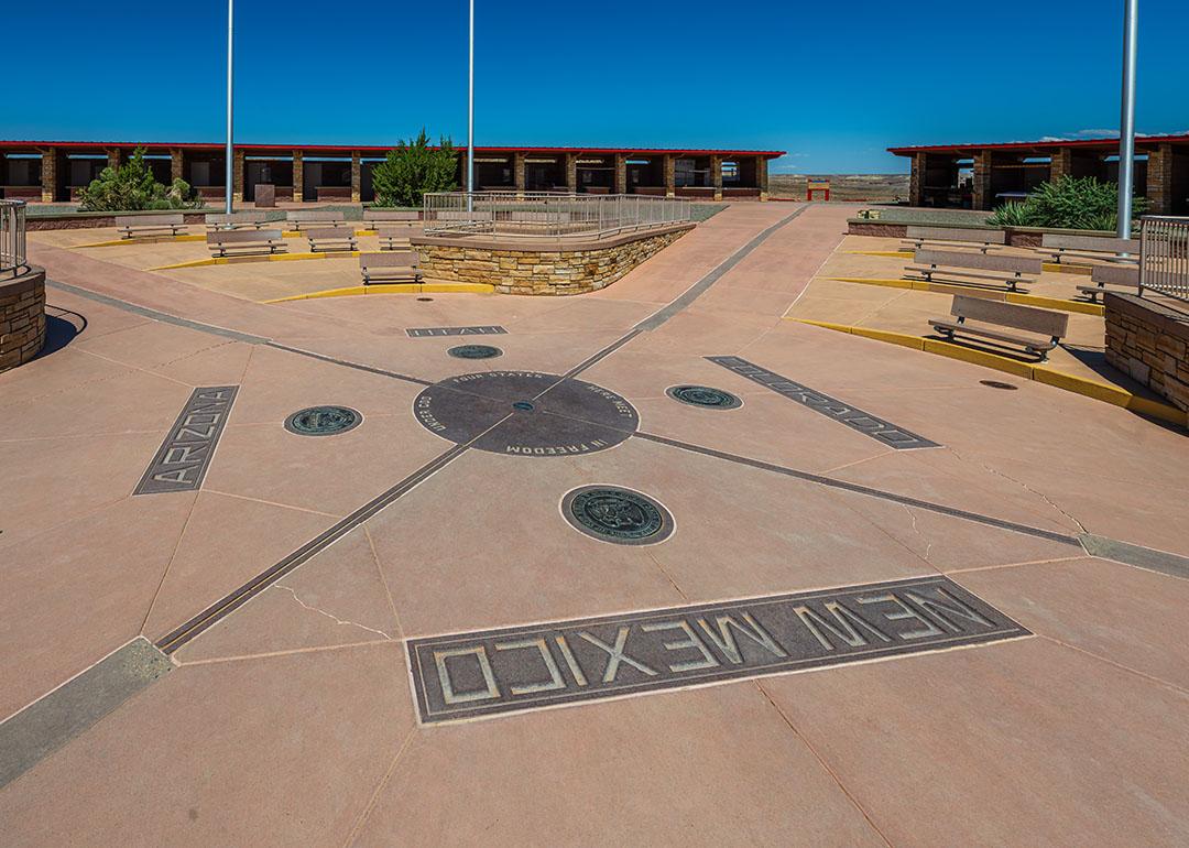 The Four Corners Monument marks the quadripoint in the Southwestern United States where the states of Arizona, Colorado, New Mexico, and Utah meet.
