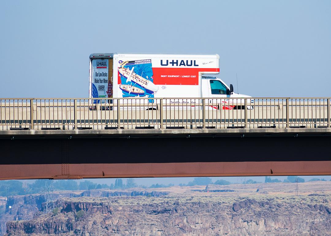 A U-Haul moving truck traveling on Perrine Memorial Bridge in Idaho.