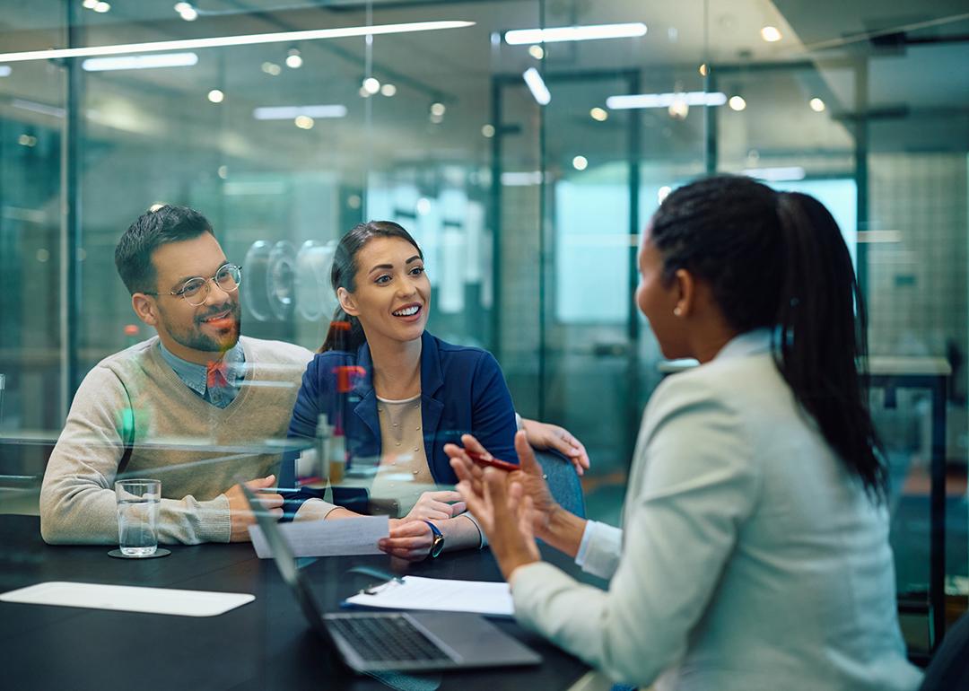 A couple having a consultation with a finance professional.