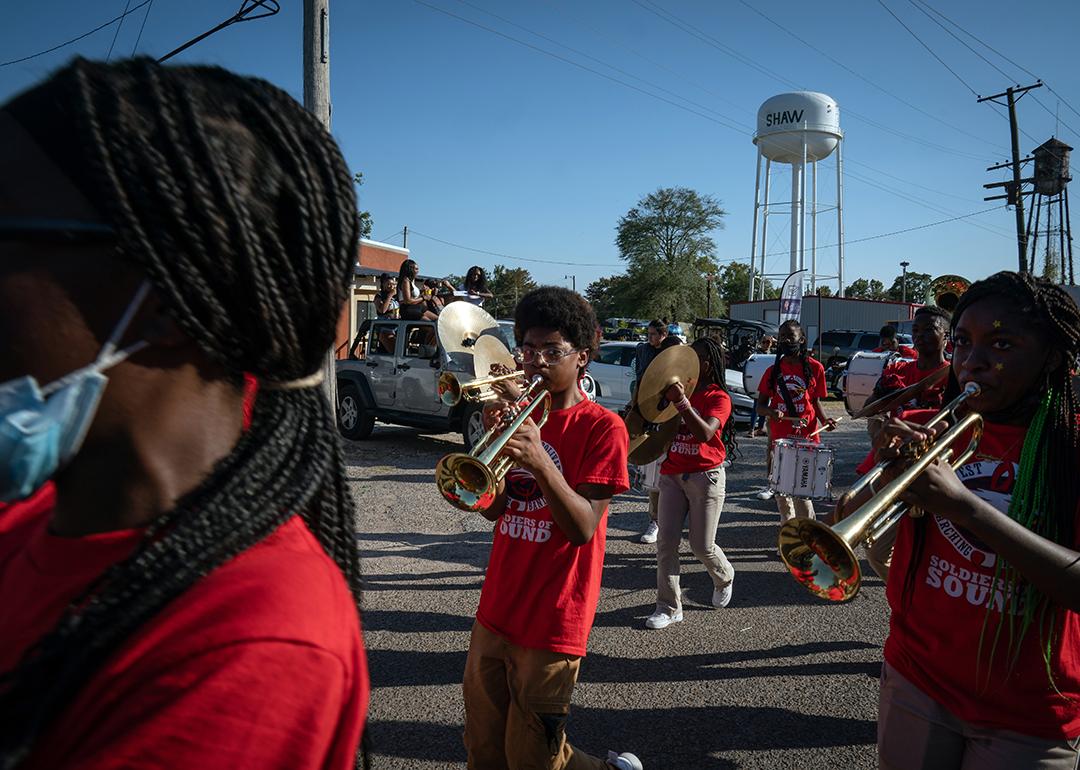 Students in the West Bolivar High School marching band take part in the McEvans School homecoming parade in Shaw, Mississippi on September 23, 2022.